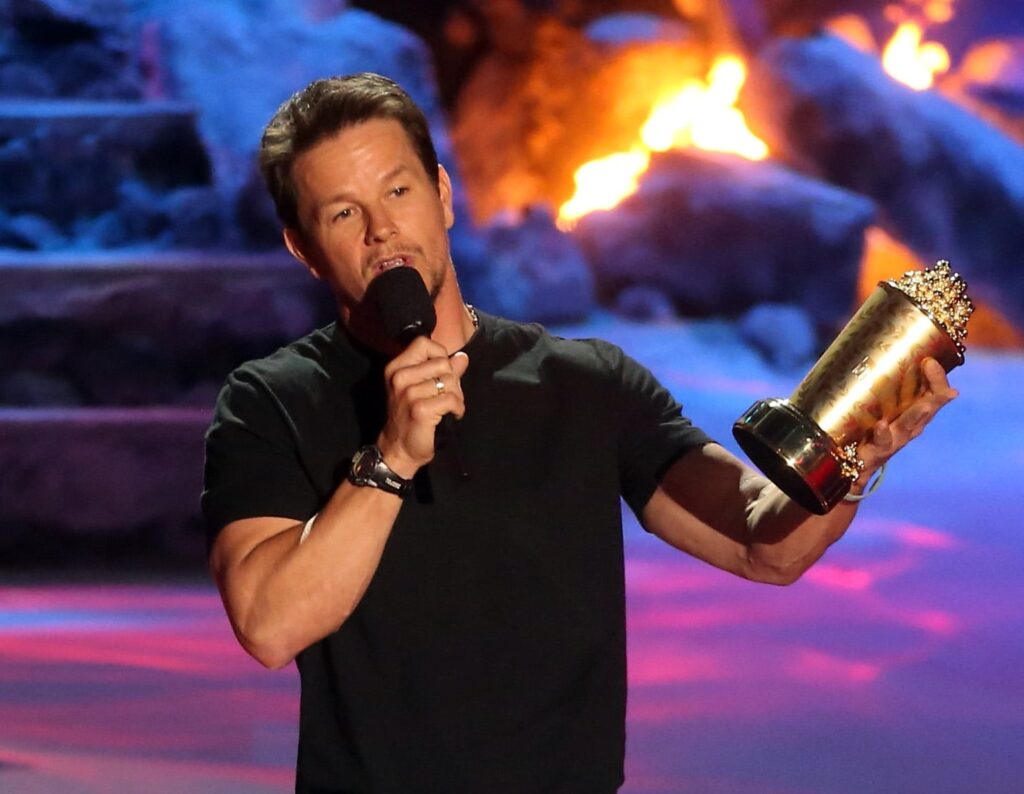 Mark Wahlberg holding an award